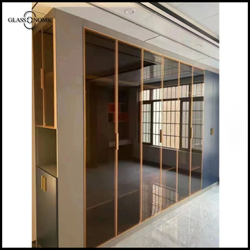 Modern aluminium wardrobe with fluted glass panels for luxury interior design