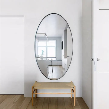 Custom shape mirrors in round, oval, rectangle and unique designs with sleek aluminium frames.