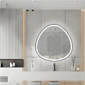 The HaloWave LED mirror glowing in a dim room, highlighting its ambient lighting and clean design.