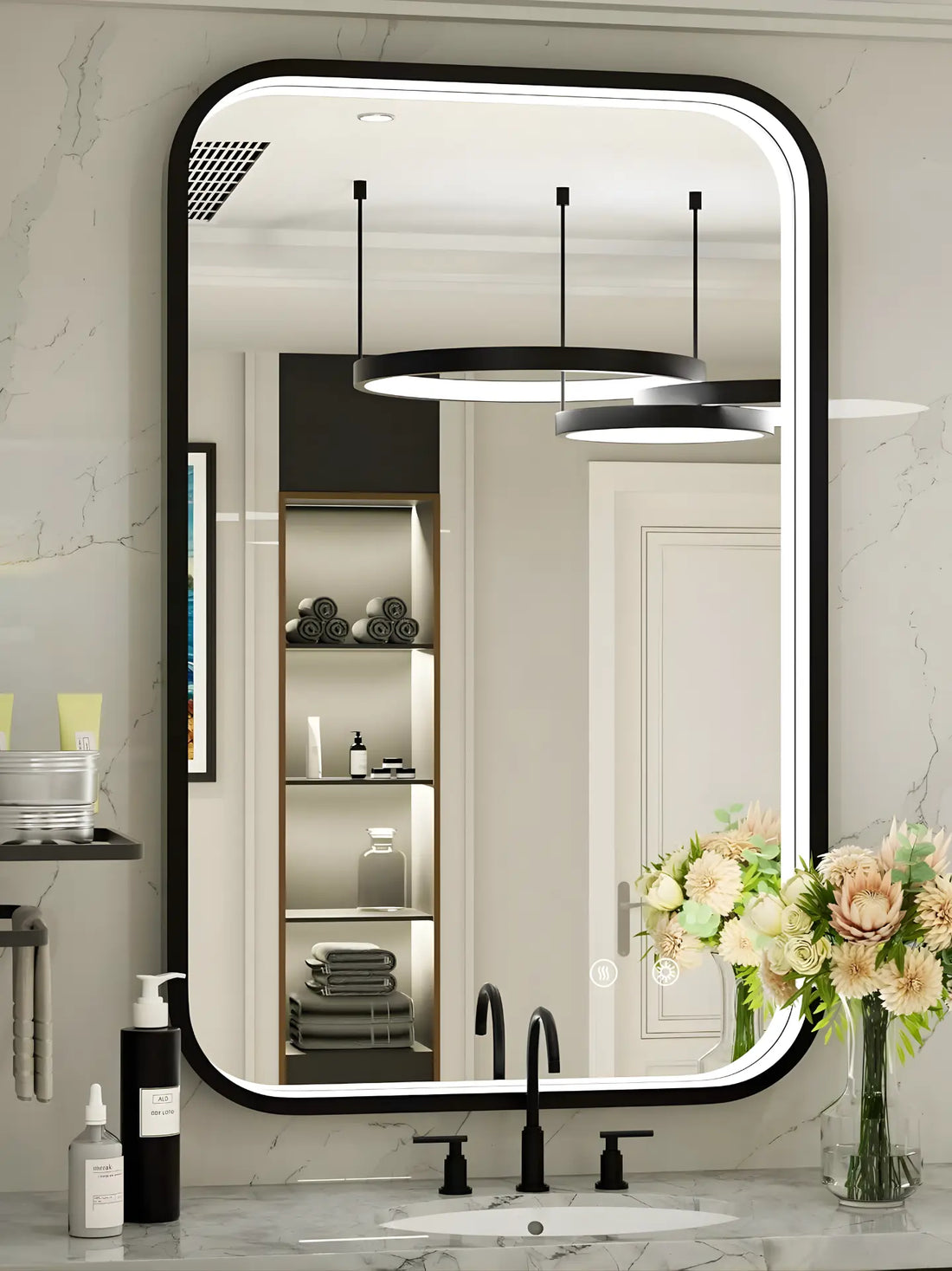 Bathroom with a large rectangular mirror, sink, and decorative elements.